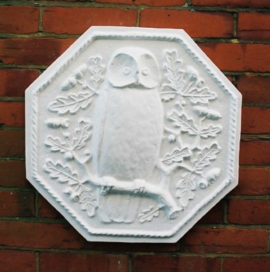 Norman Jewson's Cotwolds Arts & Crafts Movement plaster Owl plaque in Owlpen Manor